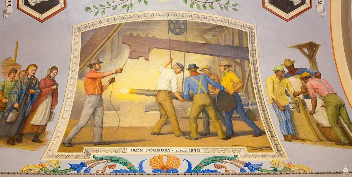 A mural depicting workers in a nineteenth-century iron foundry, the trade in which National Labor Union leader William H. Sylvis worked.